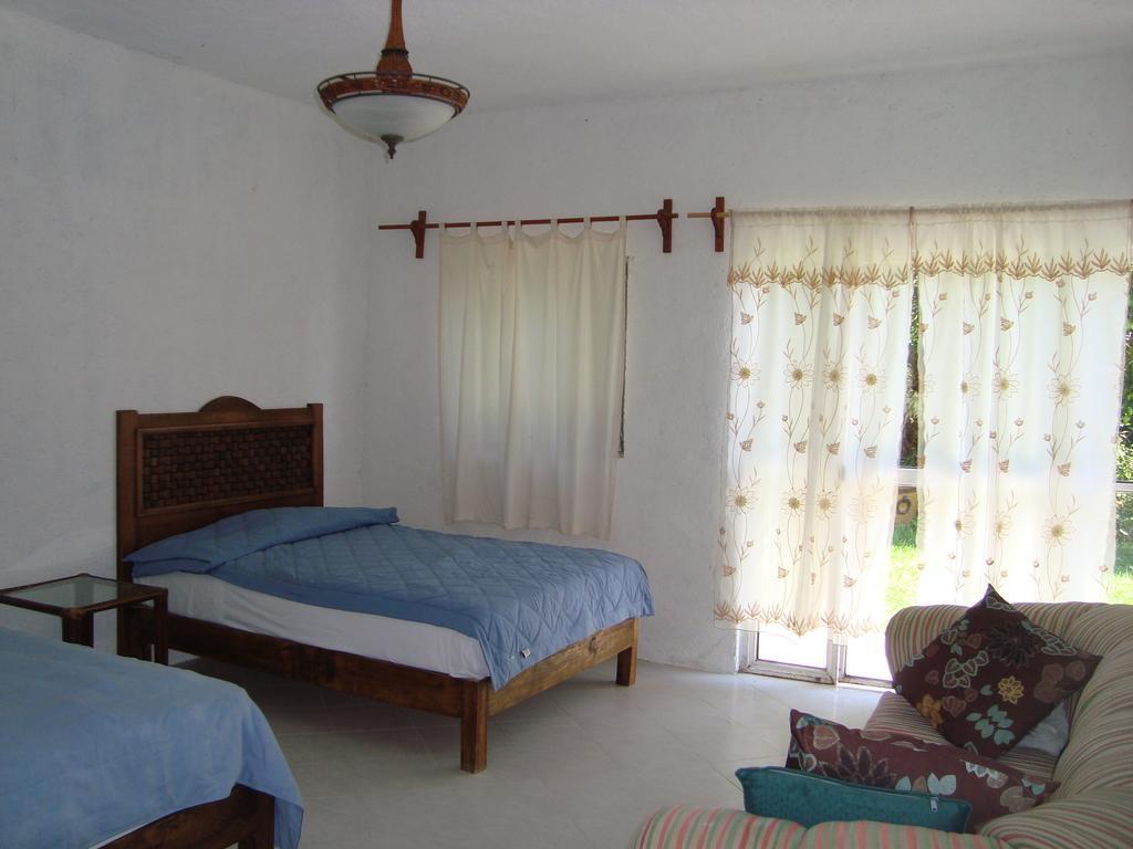 Hotel Teques Inn Tequesquitengo Quarto foto